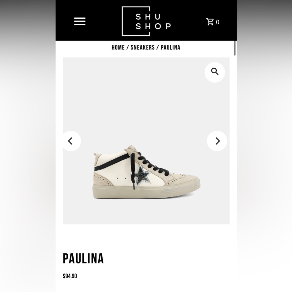 White & taupe high top laced sneakers with star detail.